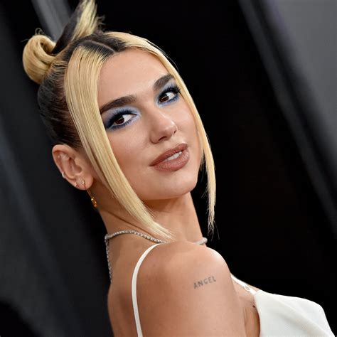 tatuajes dua lipa|Dua Lipas Tattoos: What They Are And What They Mean